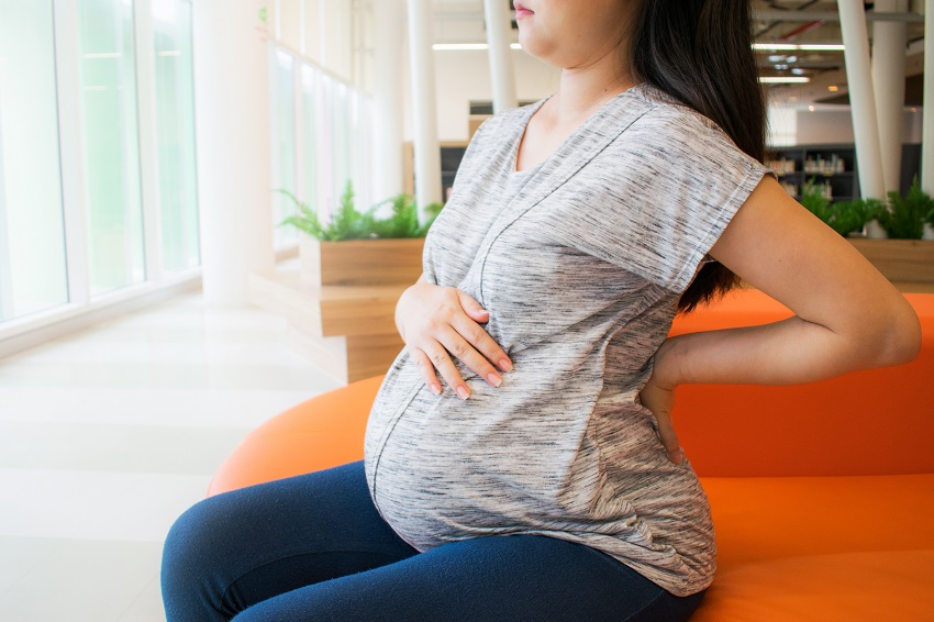 đau lưng mang thai 3 tháng đầu
